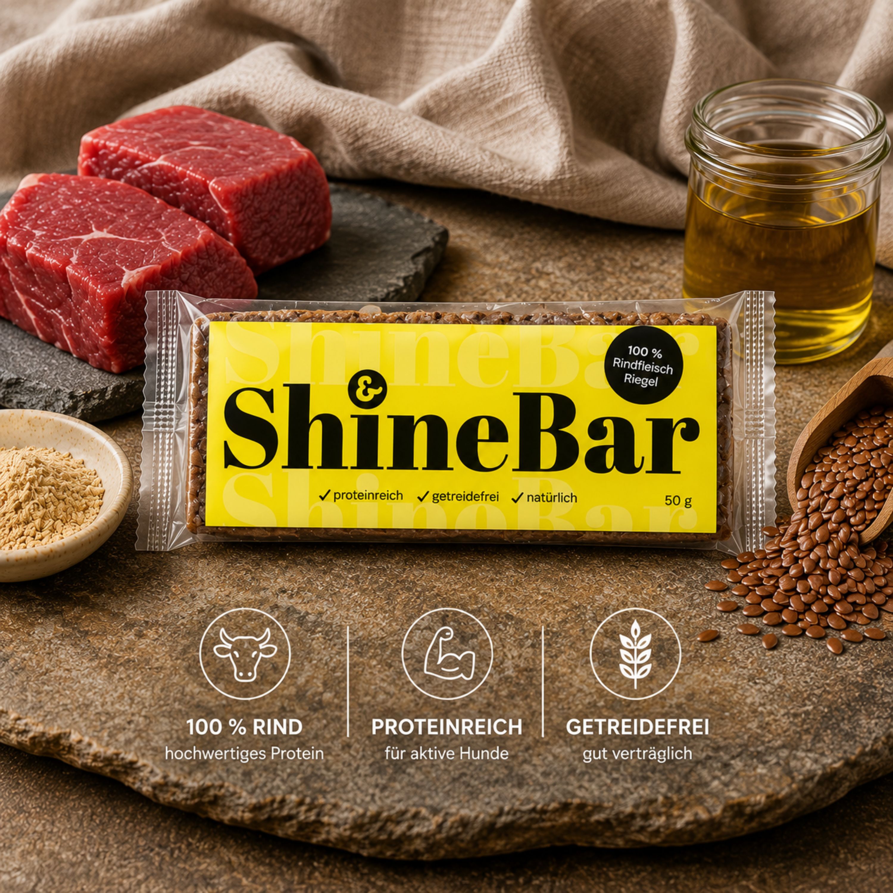 ShineBar Belohnungsriegel für Hunde aus Rind mit Bierhefe und Leinöl auf Natursteinplatte