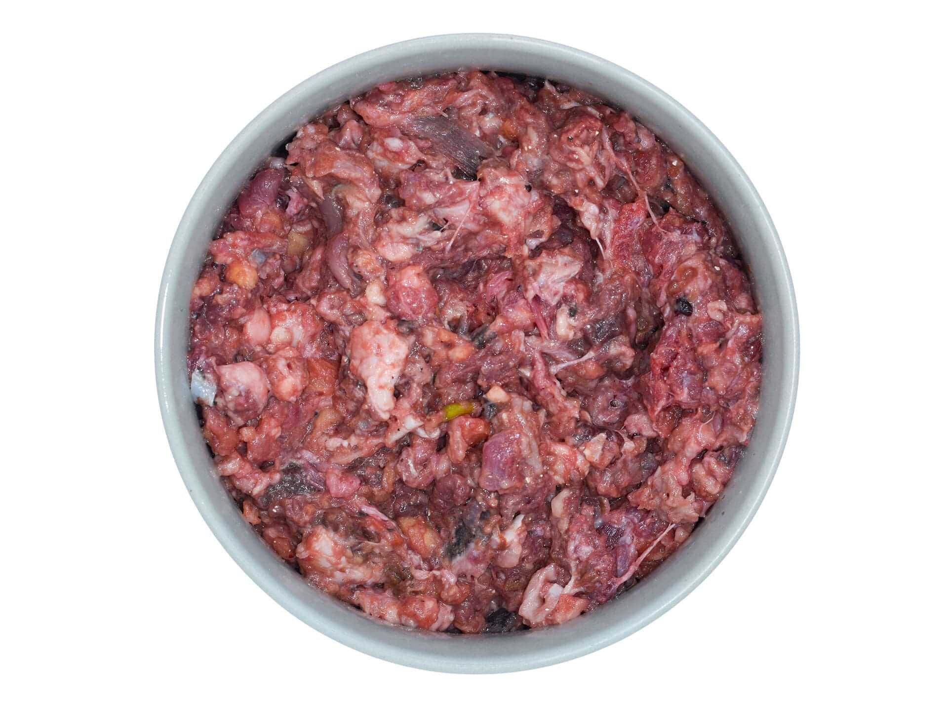 BARF-Fischmix mit Forelle, Rind und Obst – gesunde und abwechslungsreiche Hundernahrung BARF-Fischmix für Hunde im grauen Napf – Mischung aus Forelle, Rindermuskelfleisch, Obst und Lachsöl.