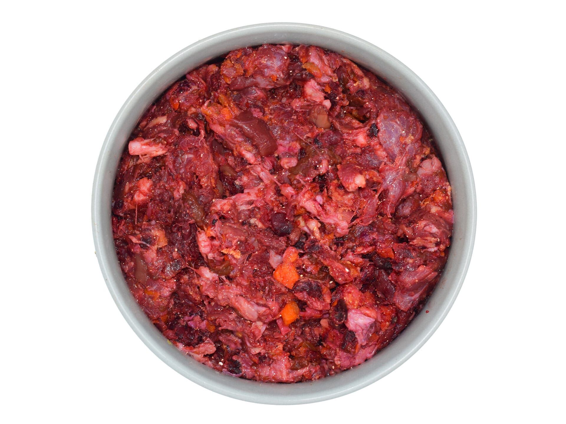 feedandmeat-barf-im-napf-energiemix Energiemix BARF-Menü in einer Schale und grauem Napf, bestehend aus Muskelfleisch, Innereien und püriertem Gemüse.
